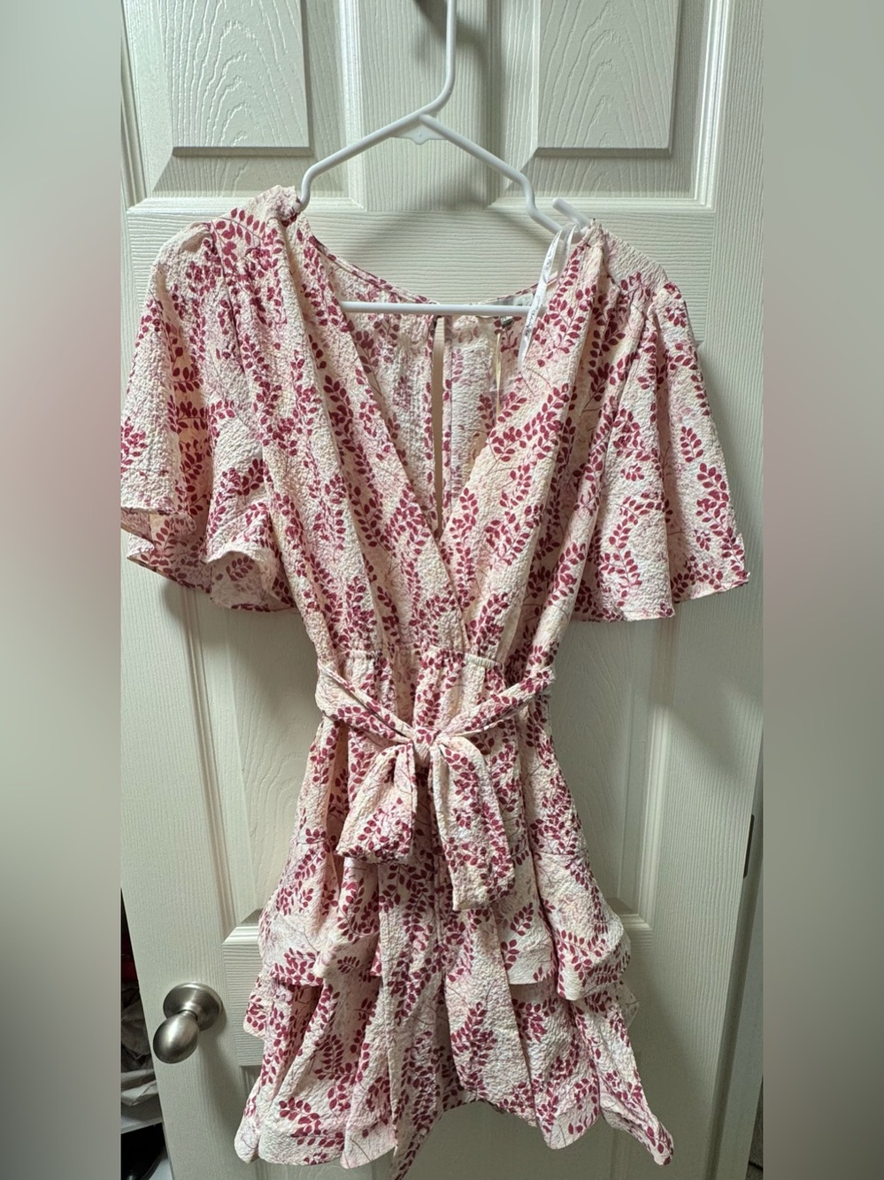 the clothing company Pink and Cream Floral Wrap Dress